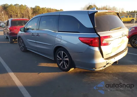 2018 Honda Odyssey Elite z USA, uszkodzony, nr VIN 5FNRL6H91JB099497